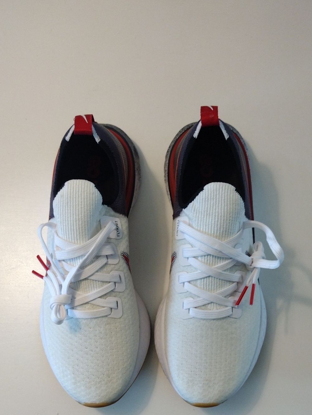 Nike React Infinity Mens White and Red Athletic Sneakers